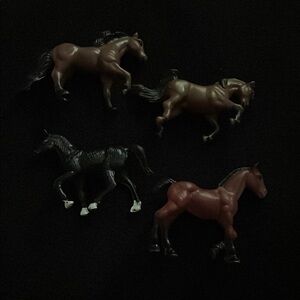 Set of Four Horse Figurines